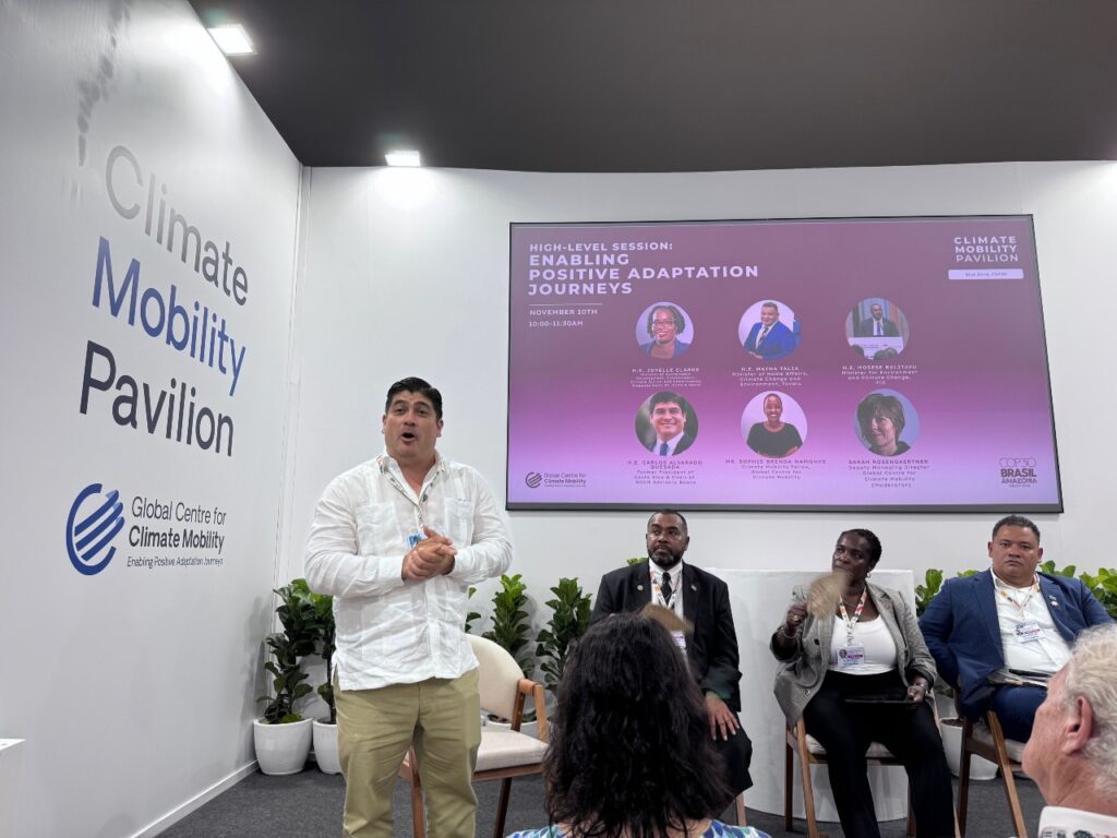Former President of Costa Rica Carlos Quesada presenting at the Climate Mobility Pavilion